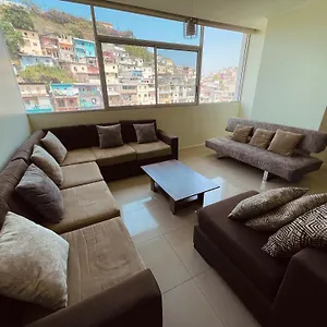 Riverfront Puerto Santa Ana Aparthotel